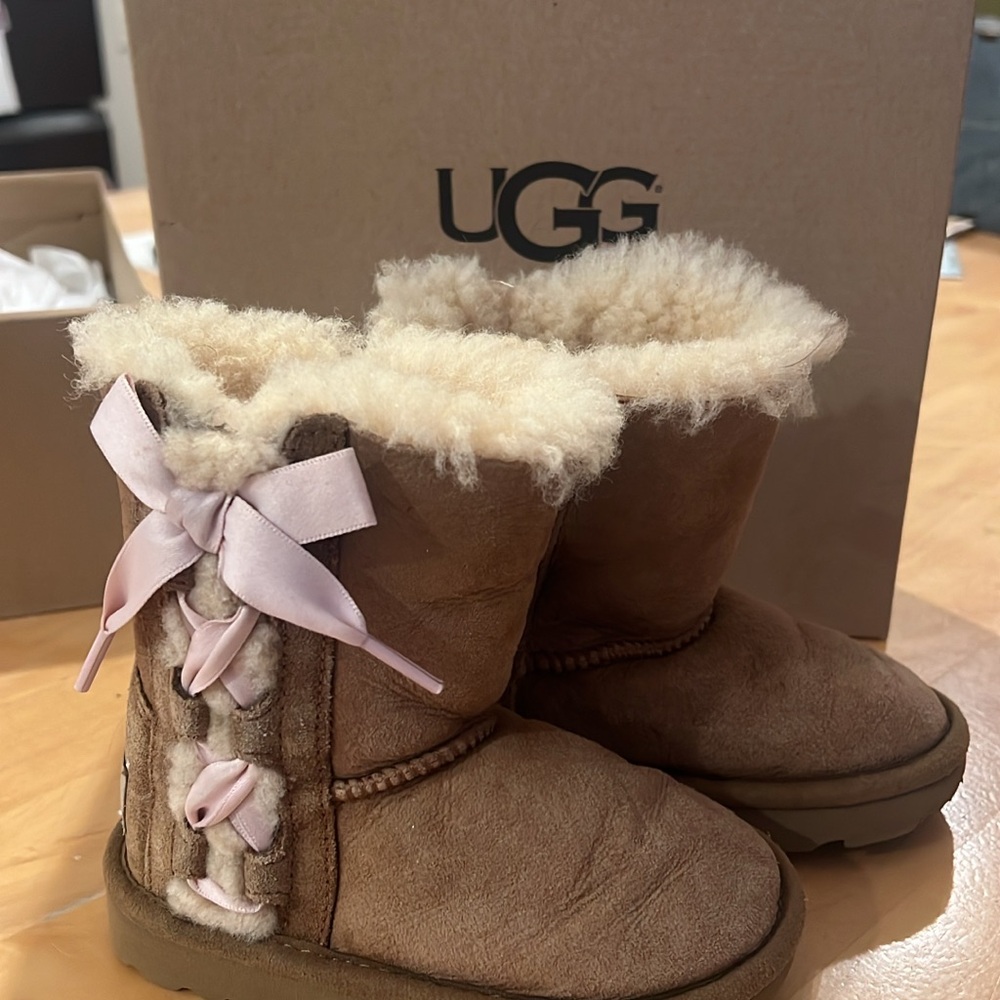 UGG Tan Sheepskin Boots with Light Pink Ribbons